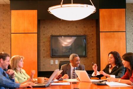 A group of lawyers sitting around a table